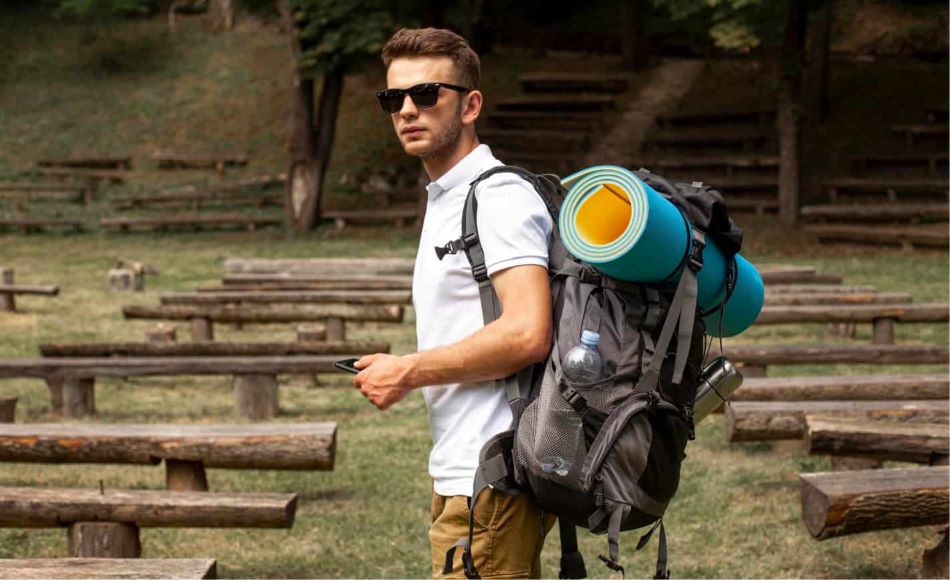 ASMN Tactical Digital Camo Travel Backpack on a mountain trail.