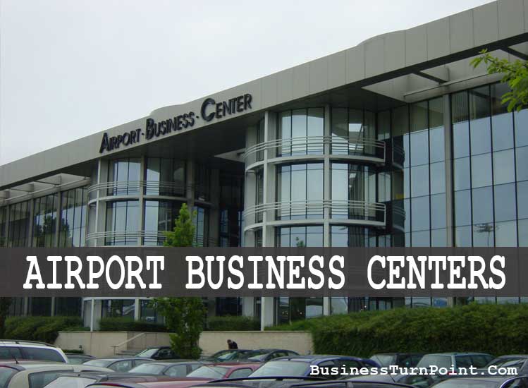 Business traveler using airport business center amenities.