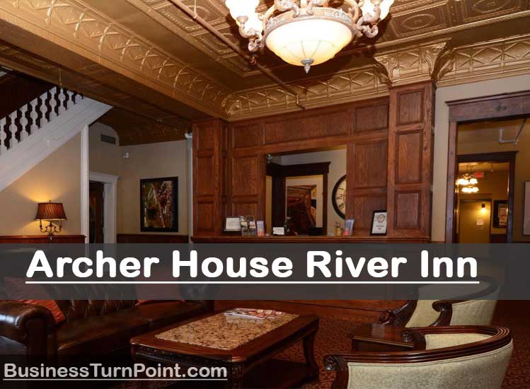 Luxurious guest room at Archer House River Inn