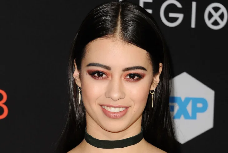 Amber Midthunder net worth: Rising star smiling on red carpet, showcasing her success that contributed to her $3 million estimated fortune.